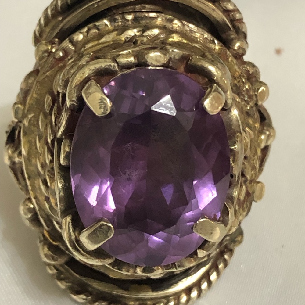 Adjustable Amethyst ring.